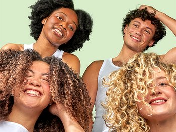 4 images of different curly hair types to establish the best curly hair routine. From left to right: wavy hair, loose curls, tight curls, coily hair.