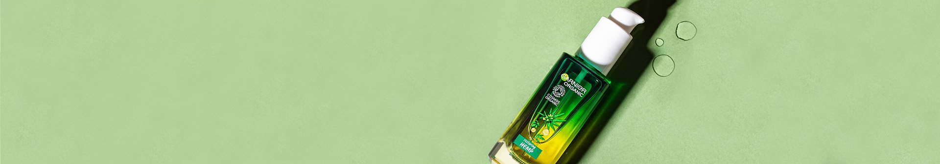 hemp oil on green background
