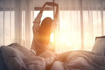 model waking up to sun rise