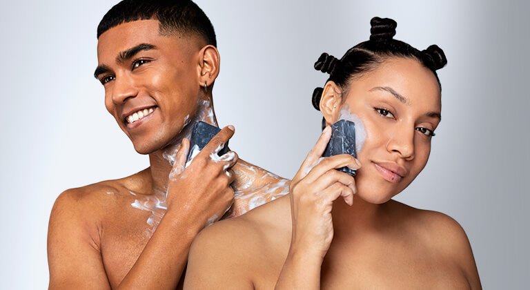 models using charcoal bar on face