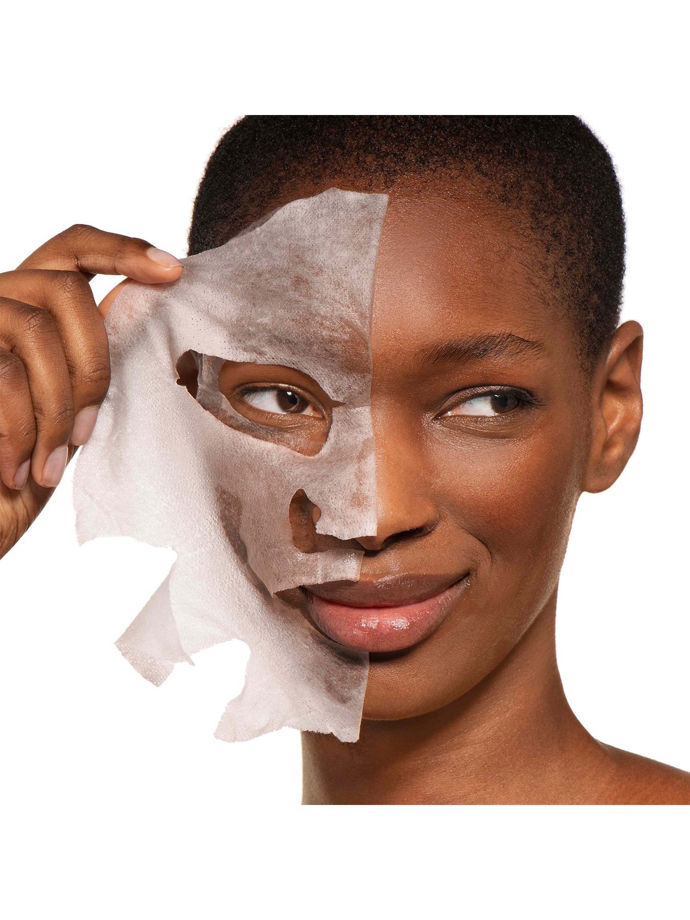 model using tissue mask on half of face